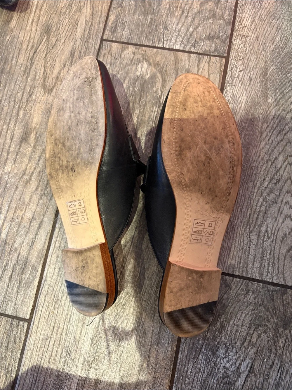 Well worn Black Slip-On Leather Loafers for women